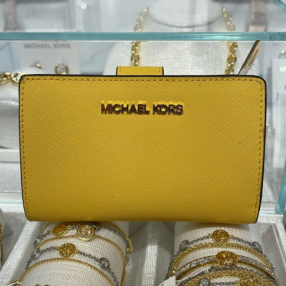 Michael Medium Crossgrain Leather Bifold Wallet
Daisy Yellow
NWT